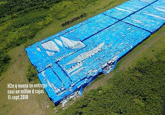 פורטו ריקו: מאות אלפי בקבוקי מים שיועדו לקרבנות הסופה מריה אותרו בארגזים סגורים
