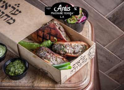 החום של הטאבון הטעמים של הבית: הכירו את עראיס לוס אנג׳לס 