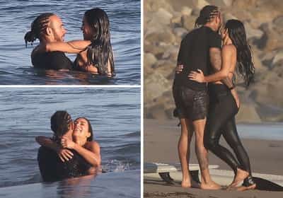 קים קרדשיאן ונהג הפורמולה משתעשעים בחוף במאליבו